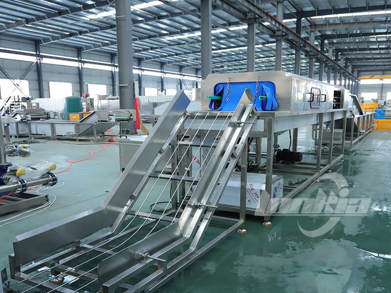 industrial crate washing machine in plant